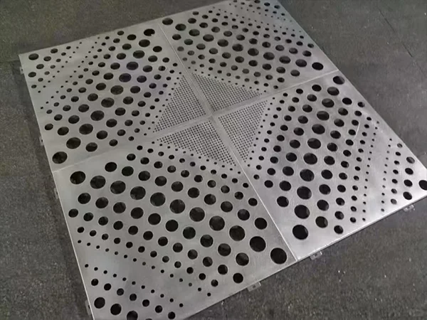Aluminum carved facade panel with round perforations of different sizes