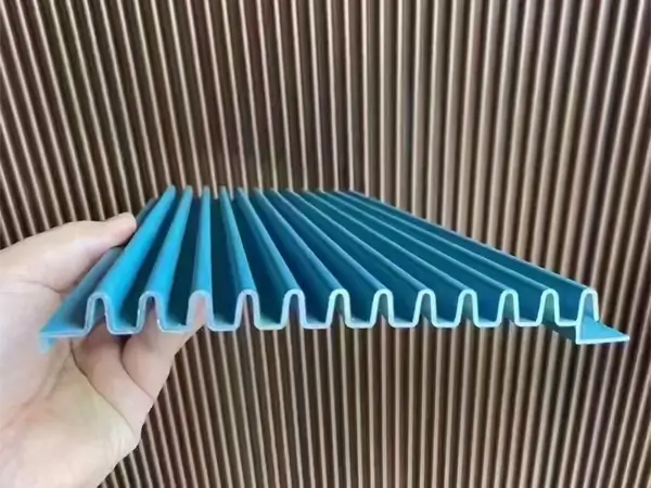 Blue architectural corrugated perforated panels
