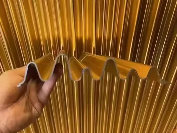 Orange architectural corrugated perforated panels