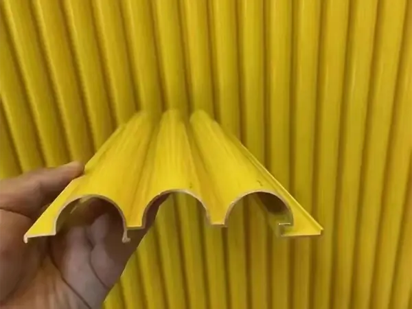 Yellow architectural corrugated perforated panels