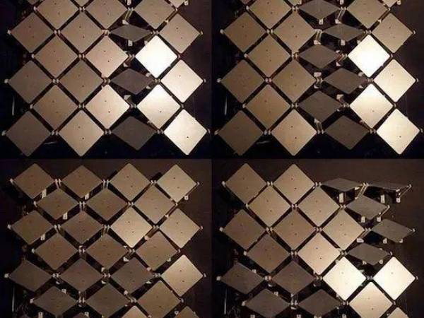 Decorative surface composed of 4 rhombus perforated kinetic panels