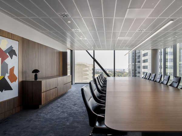 Perforated aluminum sheet used as a meeting room ceiling