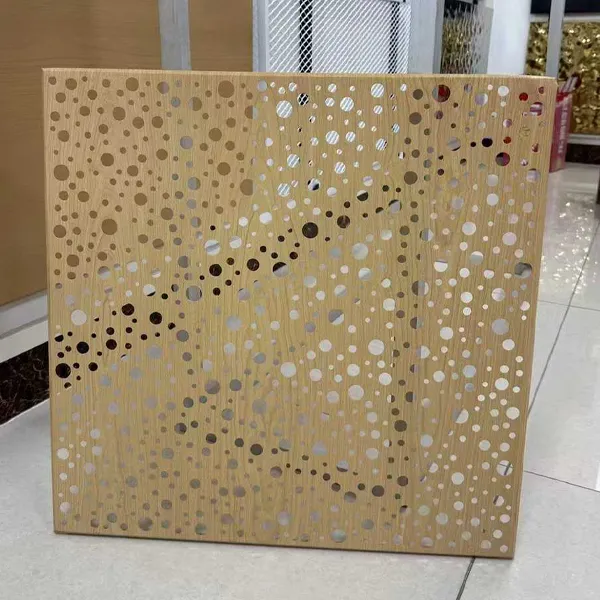 Display of irregular engraving effects on perforated metal acoustic panels