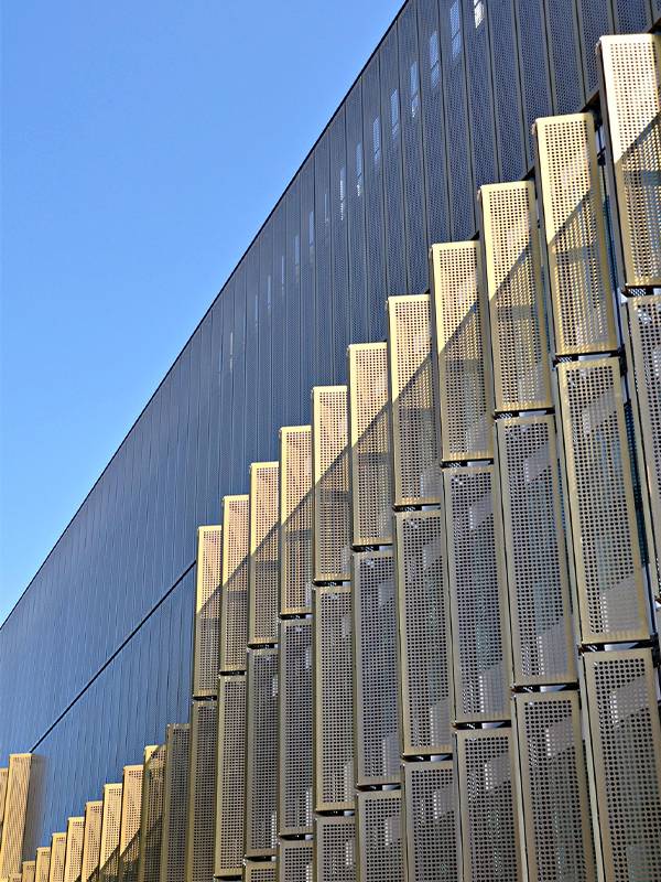Perforated sheets for building facades