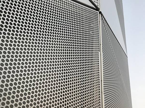 Round perforated sheets for external wall decoration of building facades