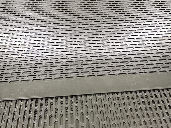 A perforated stainless steel sheets with staggered round end slot holes